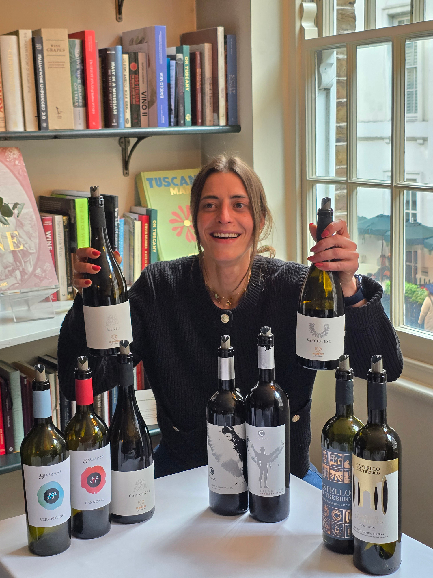 Elena Casadei with the wines sampled at DOPPO Soho Elena Casadei with the wines sampled at London's DOPPO Soho