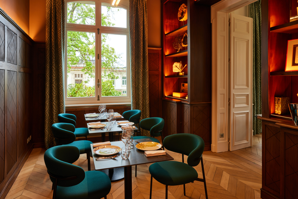 A dining room at Maison Mumm Maison Mumm dining room